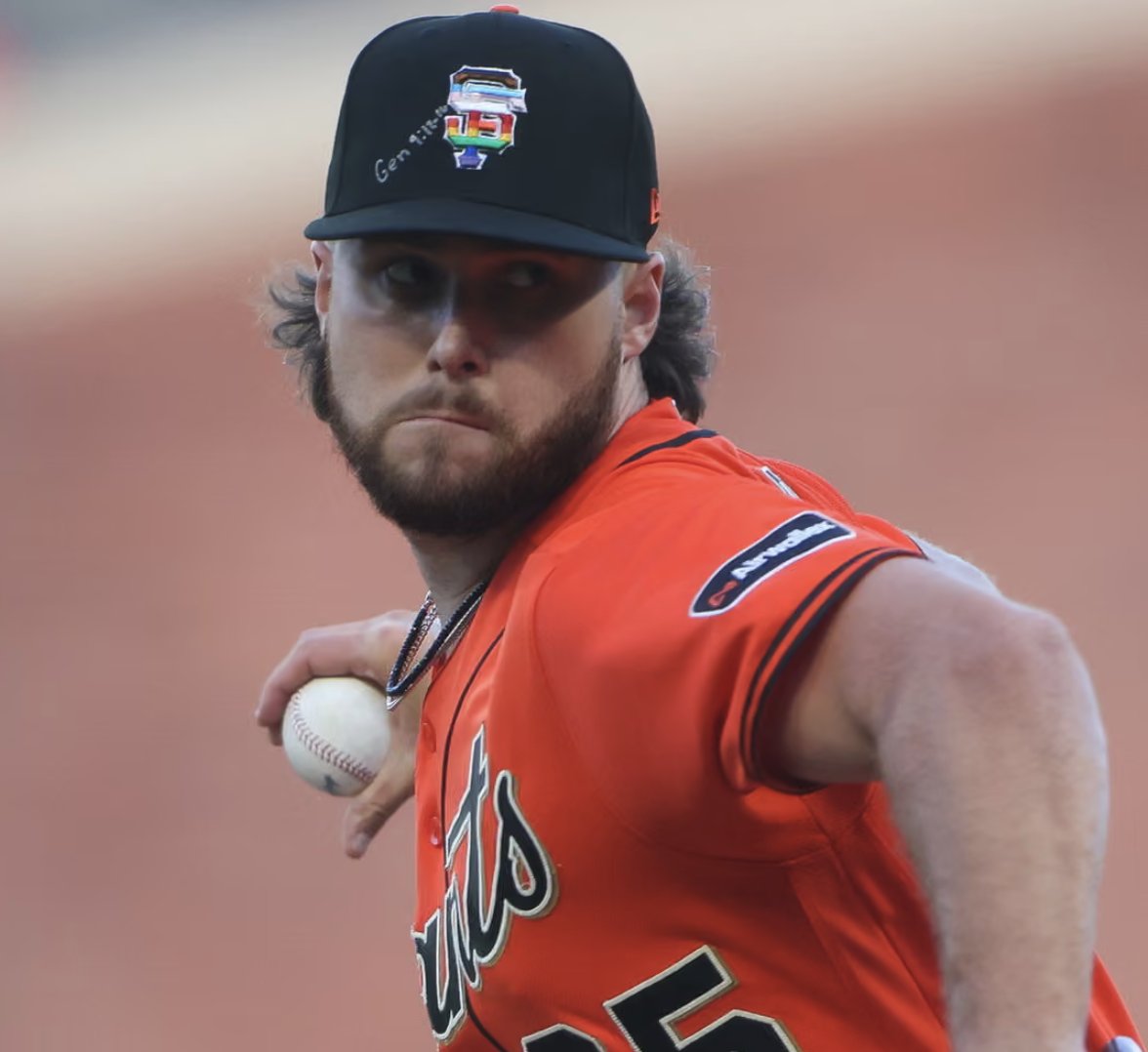 Giants pitchers with Bible verses on hats