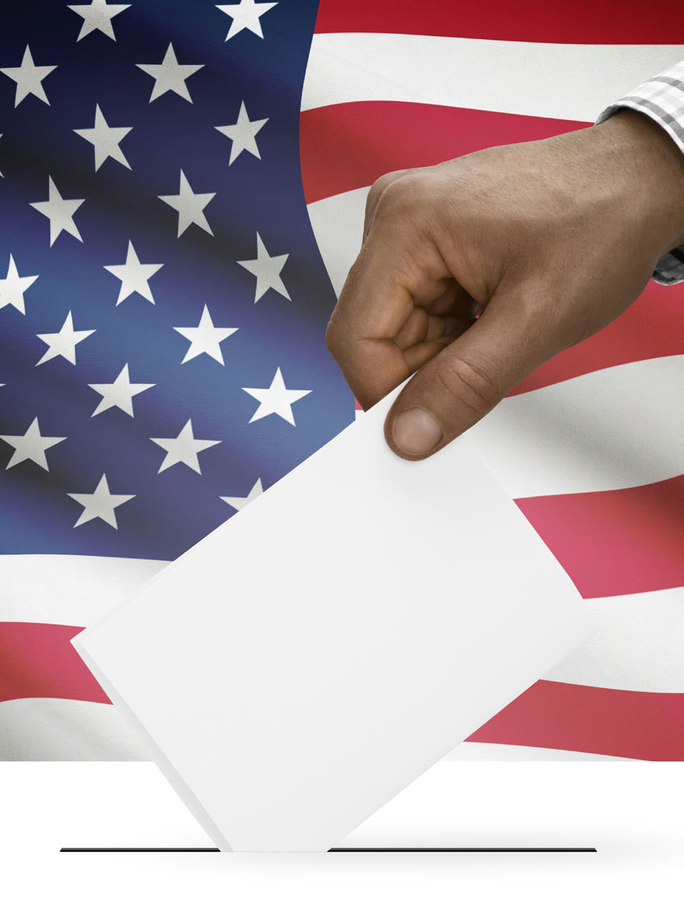 A hand drops a ballot into a ballot box in front of an American flag