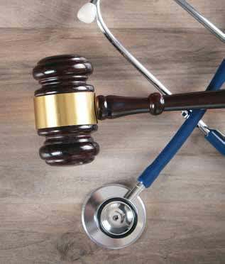 A gavel beside a stethoscope